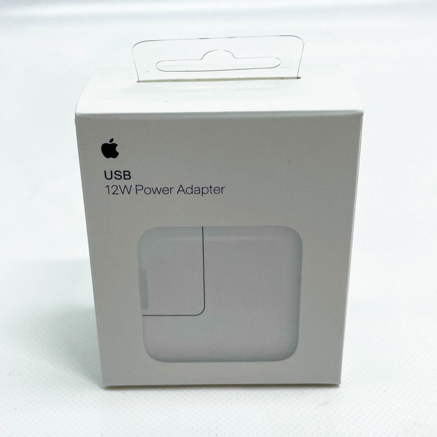 Apple 12W USB Power Adapter, weiß, kompakt, effizient, ideal für iPhone und iPad, schnelle Ladegeschwindigkeit, hochwertige Verarbeitung.