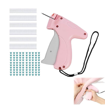 Schnellkleidungsfixer, Mini-Nähmaschine, Pistole für Kleidung, rosa, kompakt, ideal für schnelle Reparaturen und Anpassungen.